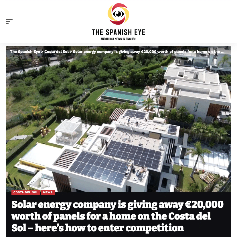 Aerial view of white-roofed homes with solar panels in a sunny Costa del Sol development with a giveaway article context.